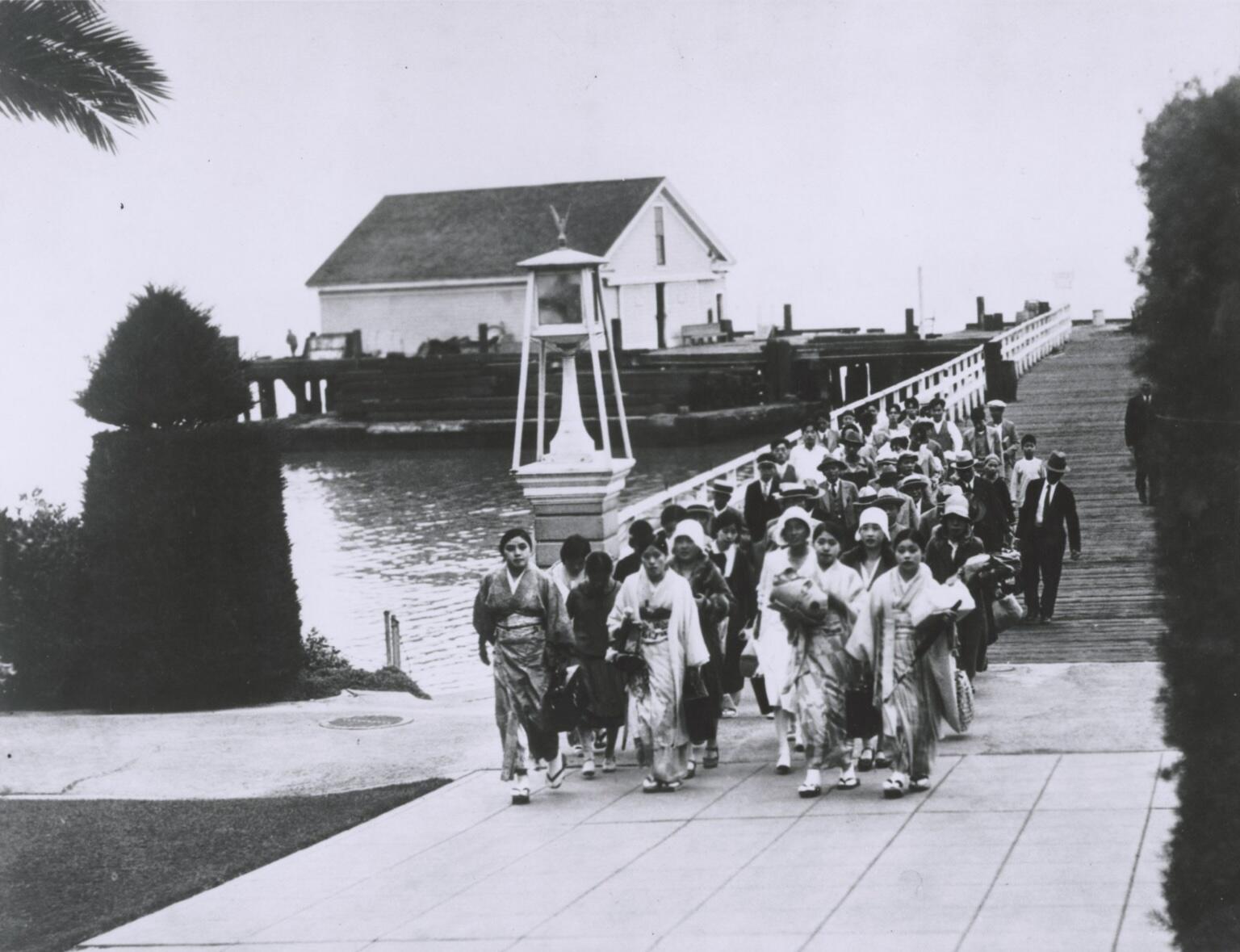 Immigrants entering Angel Island, which served as an immigration and detention center from 1910 to 1940.