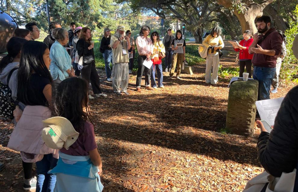 Asia Pacific and the Berkeley Campus” tour stops at the stone lanterns in front of campus’s Alumni House.