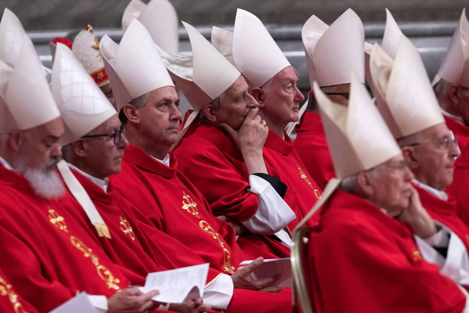 Cardinal Matteo Zuppi attends a mass on the third of nine days of mourning for late Pope Francis, in St. Peter's Basilica at the Vatican